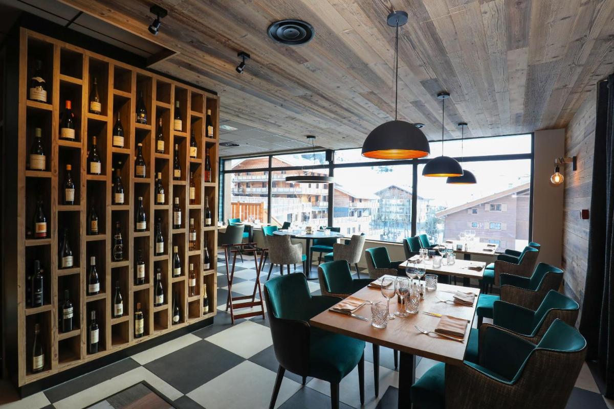 Restaurant ou autre lieu de restauration dans l'établissement Résidence Odalys Mendi Alde