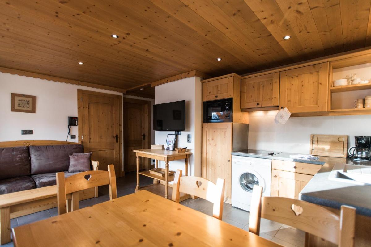 Cuisine ou kitchenette dans l'établissement Les Chalets de La Griyotire