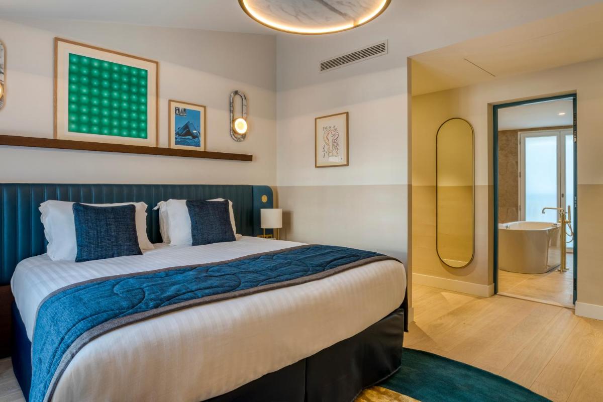 Un ou plusieurs lits dans un hébergement de l'établissement Maison Albar Hotels L’Imperator