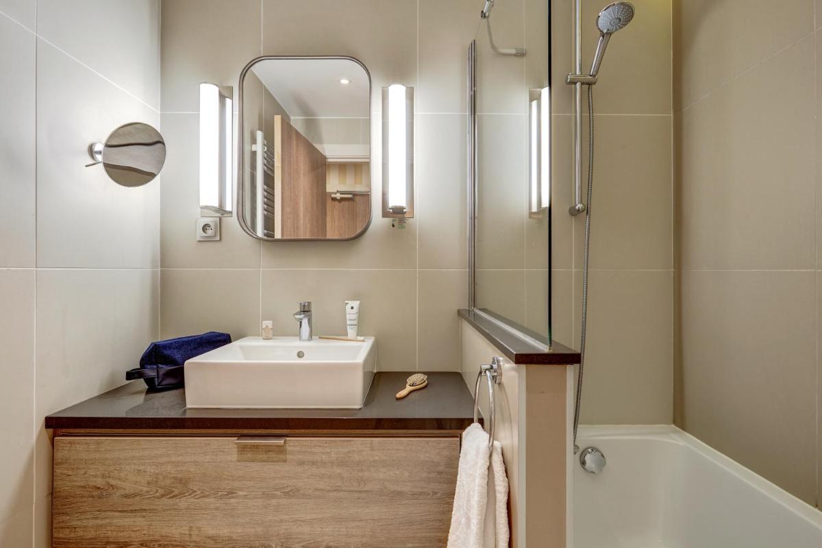 Salle de bains dans l'établissement Résidence Pierre & Vacances Premium Presqu'Ile de la Touques