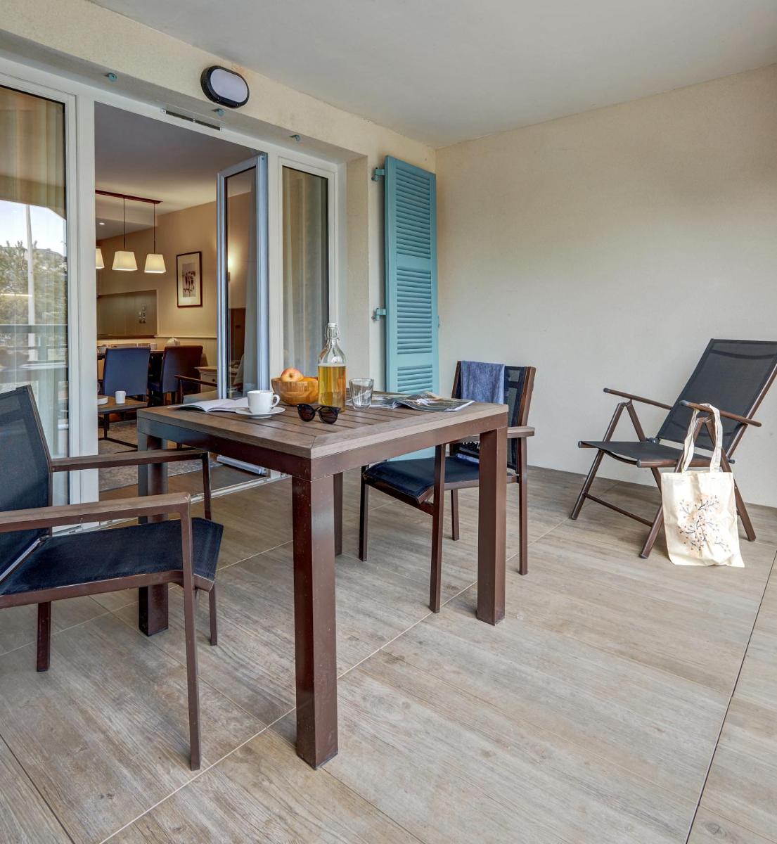 Coin salon dans l'établissement Résidence Pierre & Vacances Premium Presqu'Ile de la Touques