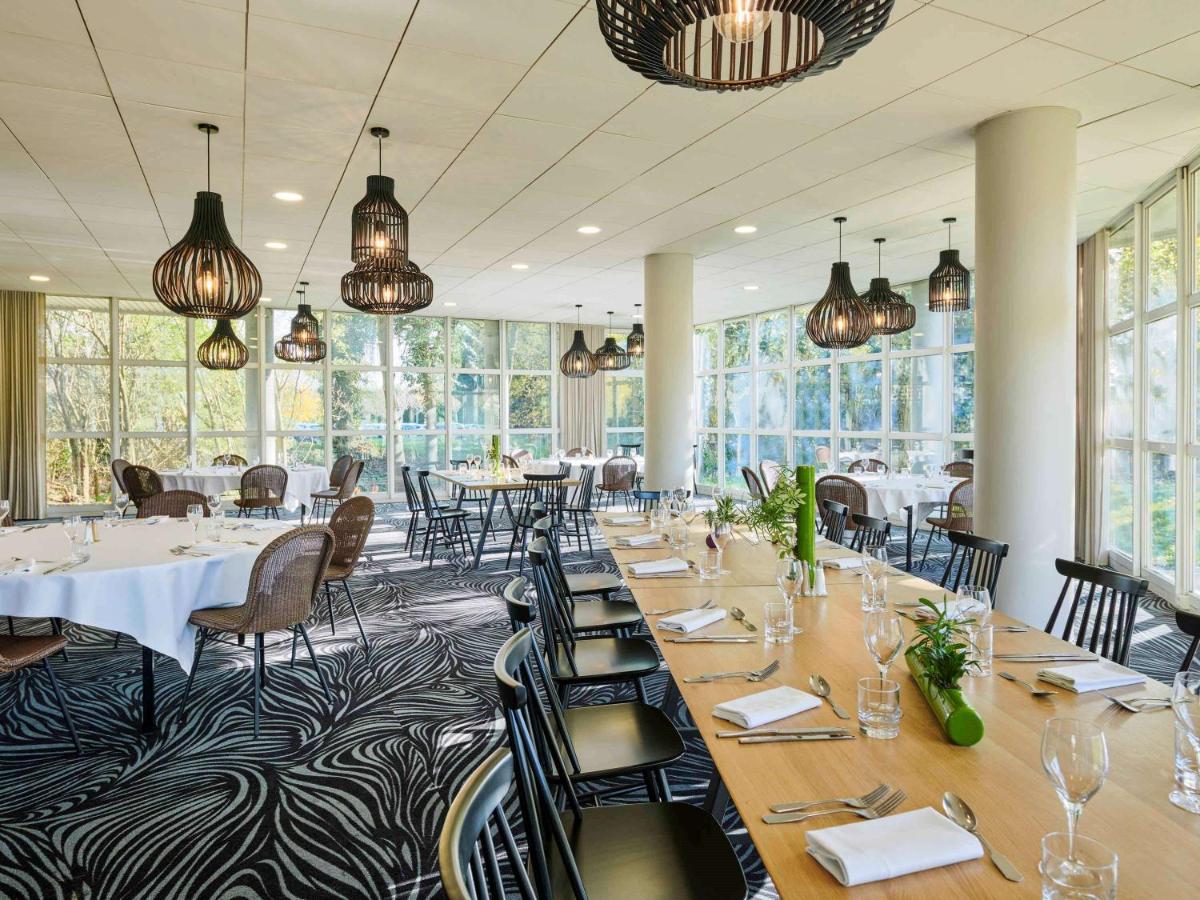 Restaurant ou autre lieu de restauration dans l'établissement Novotel Senart Golf De Greenparc