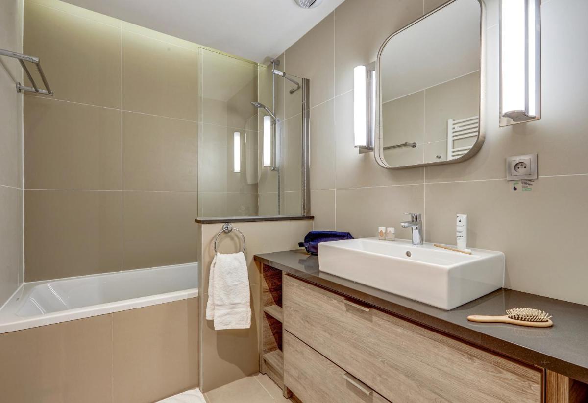 Salle de bains dans l'établissement Résidence Pierre & Vacances Premium Presqu'Ile de la Touques