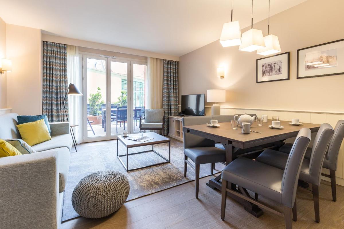 Coin salon dans l'établissement Résidence Pierre & Vacances Premium Presqu'Ile de la Touques