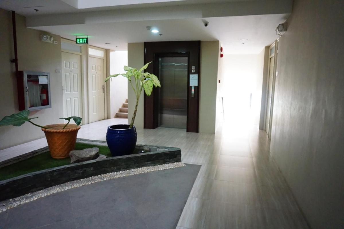 Cozy condo unit 5mins from Mactan Cebu Int'l Airport with Netflix - Housity