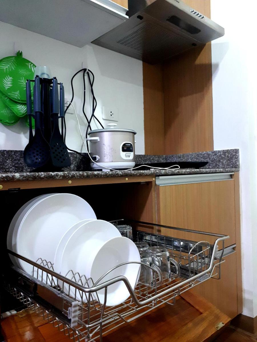 Cozy condo unit 5mins from Mactan Cebu Int'l Airport with Netflix - Housity