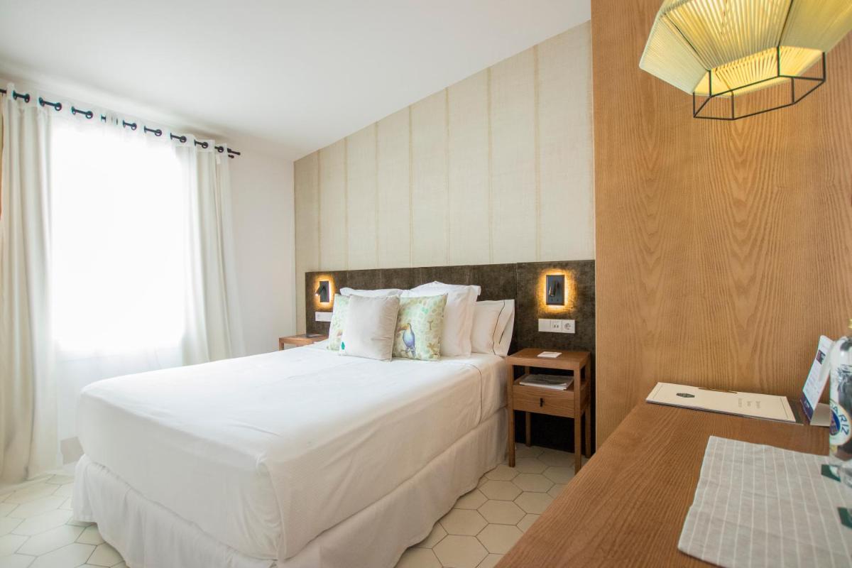 Cama o camas de una habitación en Boutique Hotel Sant Roc & Spa