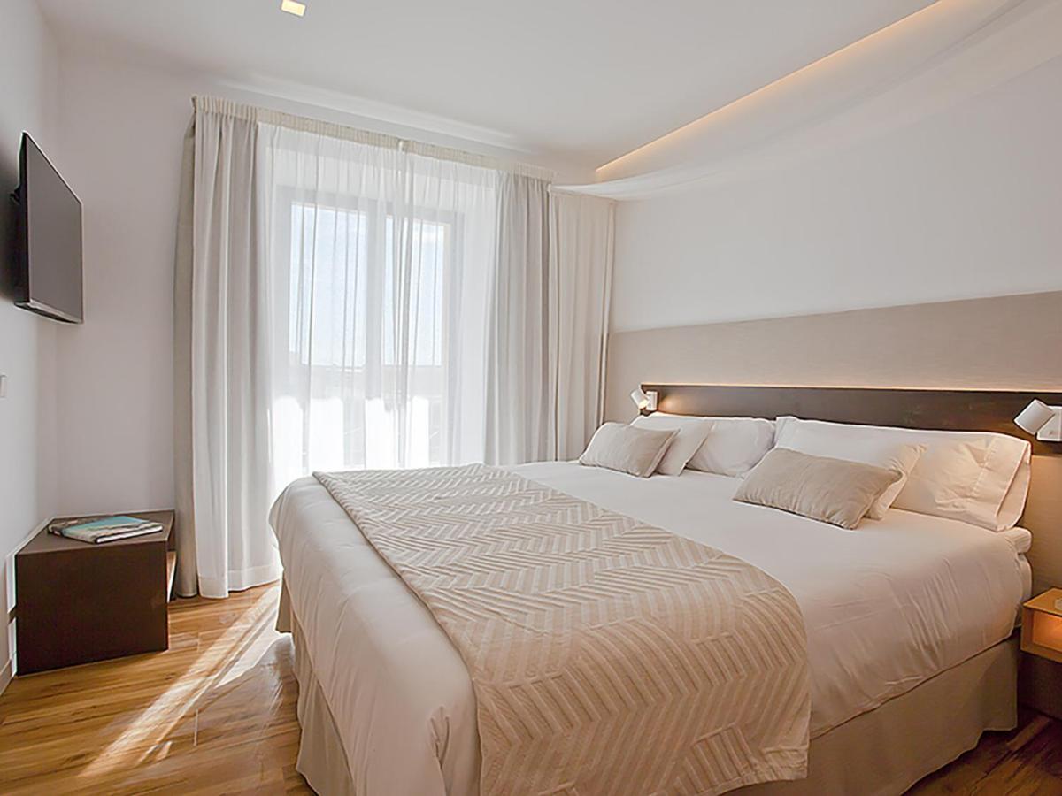 Cama o camas de una habitación en Ynaira hotel & Spa