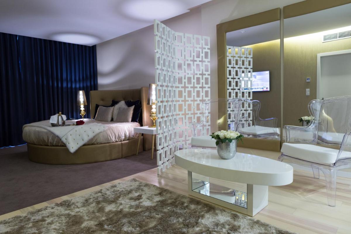 Uma cama ou camas num quarto em Hotel de Ilhavo Plaza & Spa