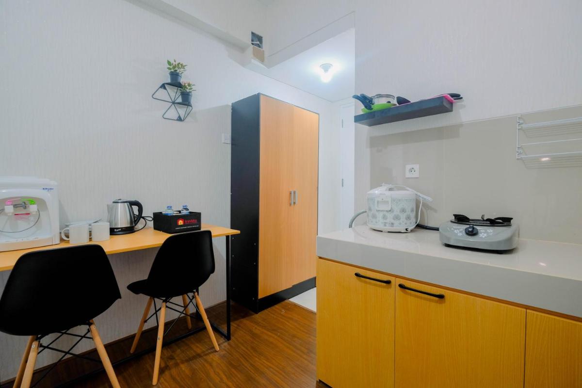 Suitetrails - Modern Studio Room Apartment at Bogorienze Resort By Travelio