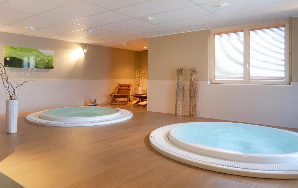 Salle de bains dans l'établissement SOWELL HOTELS Mont Blanc et SPA