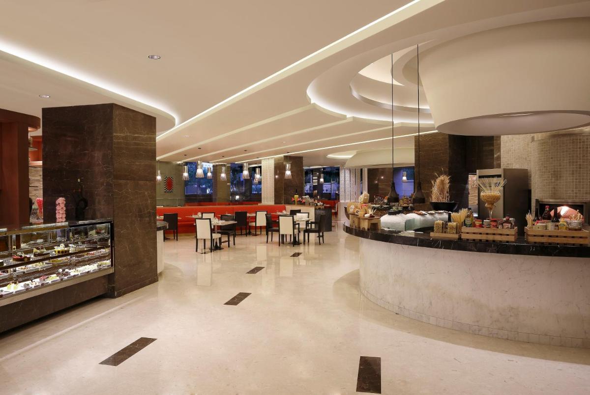 a hotel lobby with aasteryasteryasteryasteryasteryasteryasteryasteryasteryasteryastery at InterContinental Jaipur Tonk Road by IHG in Jaipur