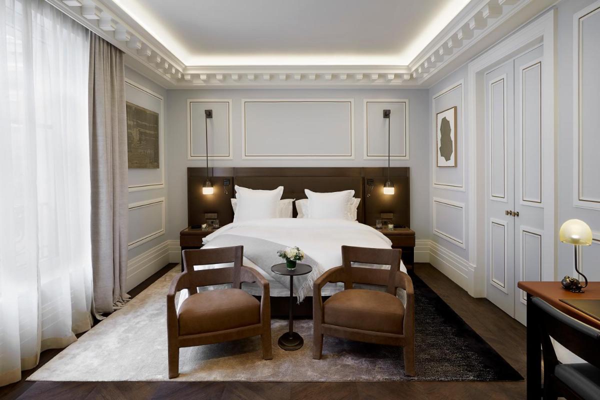 Un ou plusieurs lits dans un hébergement de l'établissement Maison Villeroy