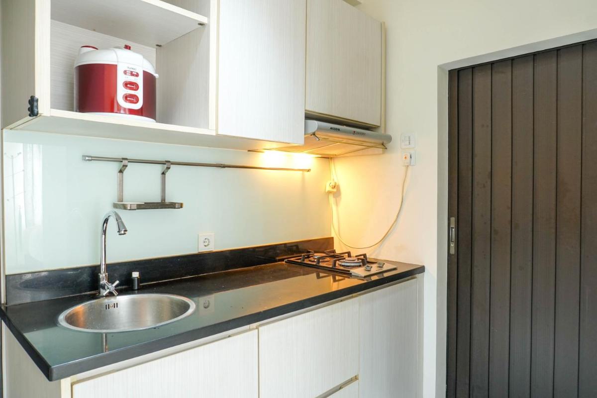 Best Spacious Studio Belmont Residence Puri Apartment By Travelio - Housity