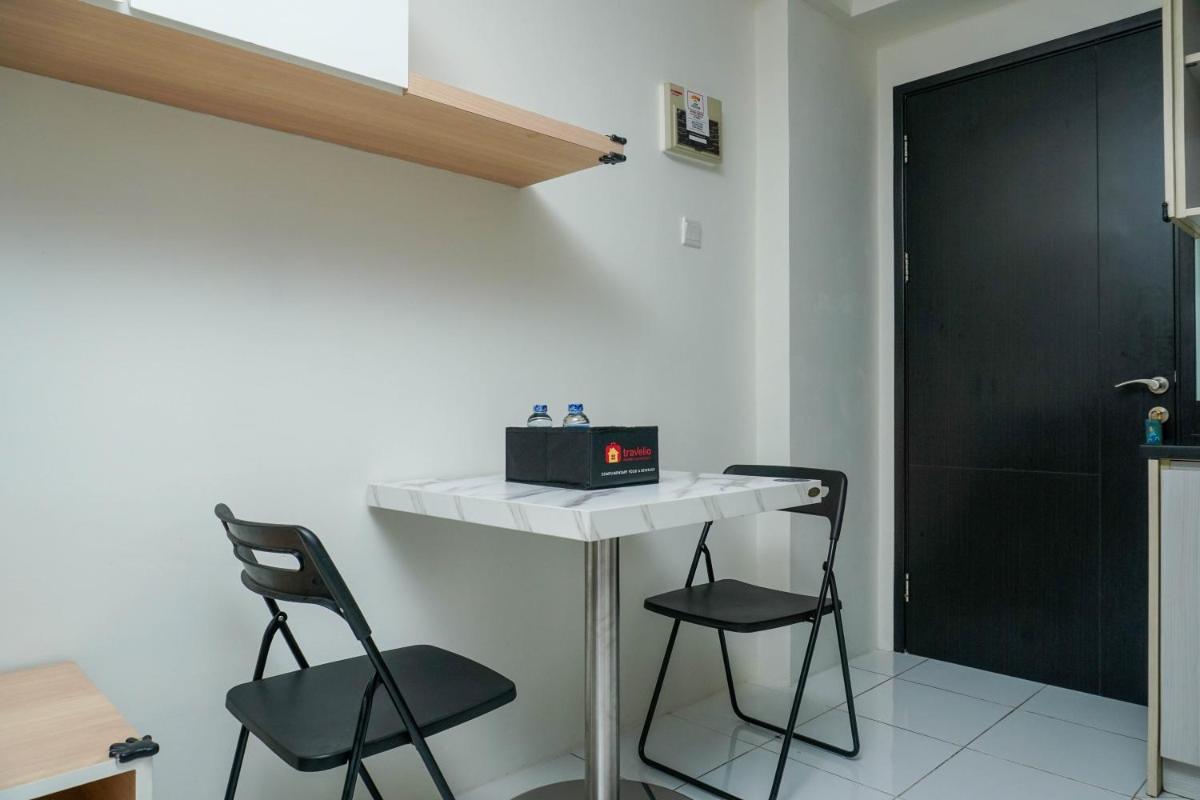 Best Spacious Studio Belmont Residence Puri Apartment By Travelio - Housity
