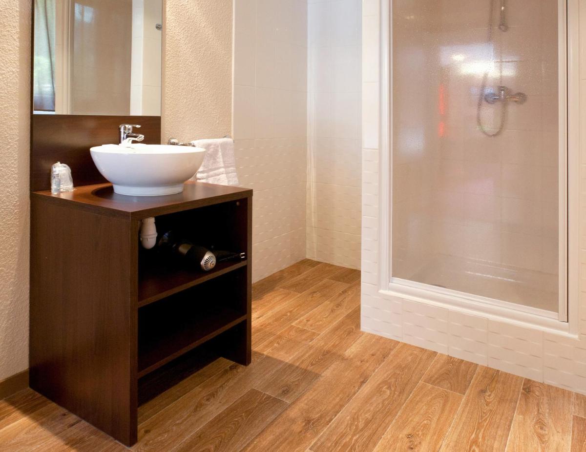 Salle de bains dans l'établissement SOWELL HOTELS Mont Blanc et SPA