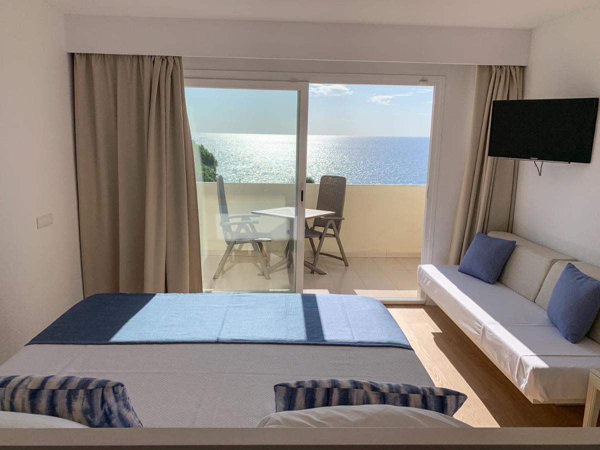 Cama o camas de una habitación en Blau Punta Reina