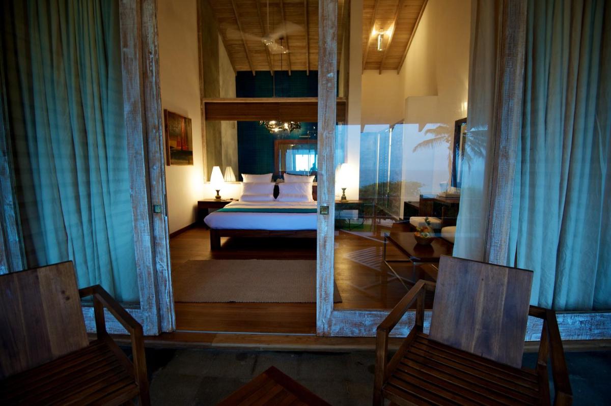 Roman Beach Hotel - Housity