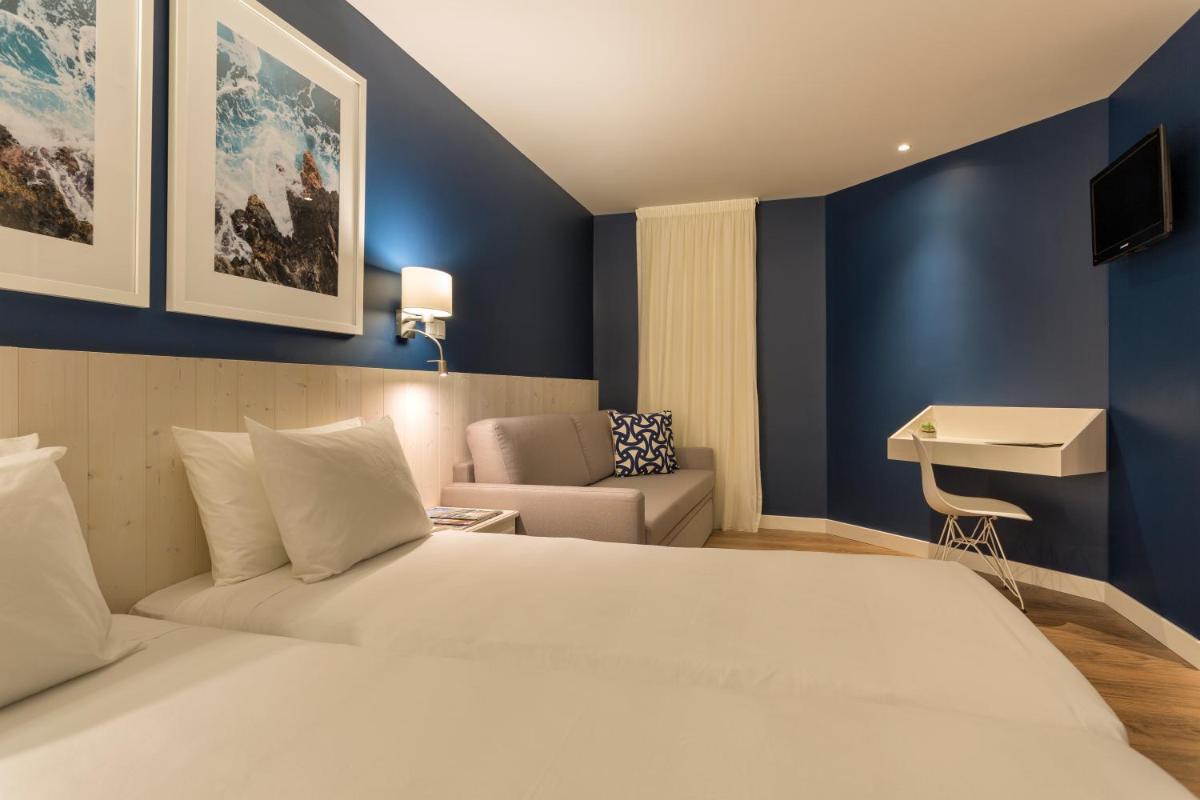 Uma cama ou camas num quarto em AP Adriana Beach Resort
