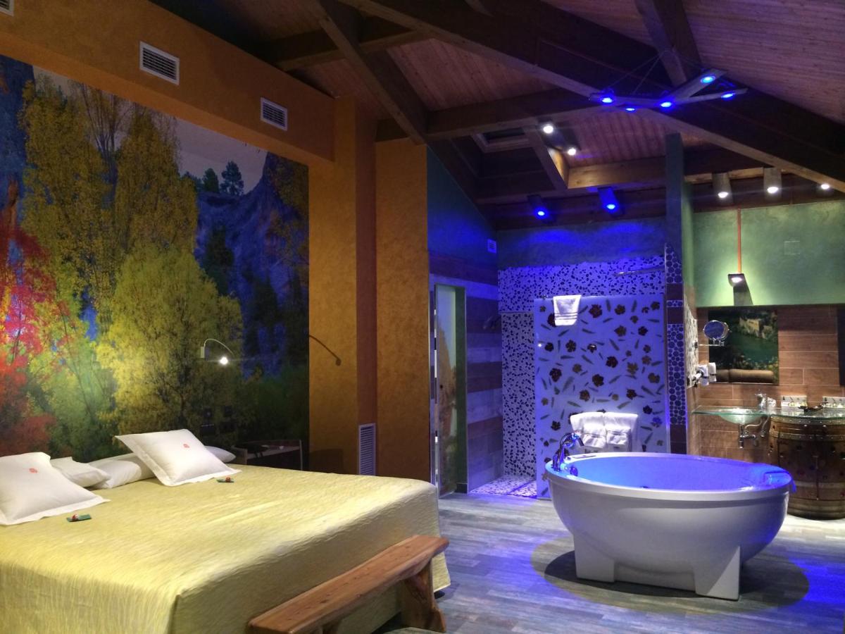 Cama o camas de una habitación en Hotel SPA El Lagar de Isilla