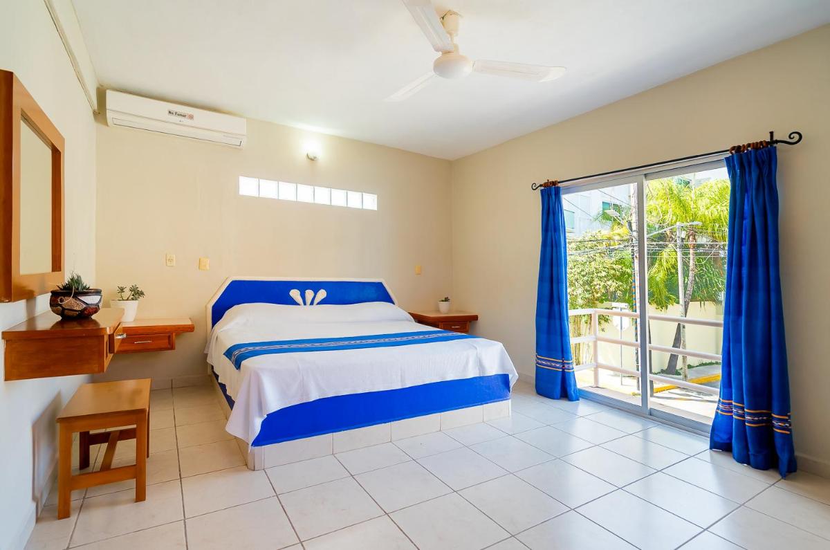 Hotel Yumkiin - Cerca Del Ferry y Terminal ADO - Housity
