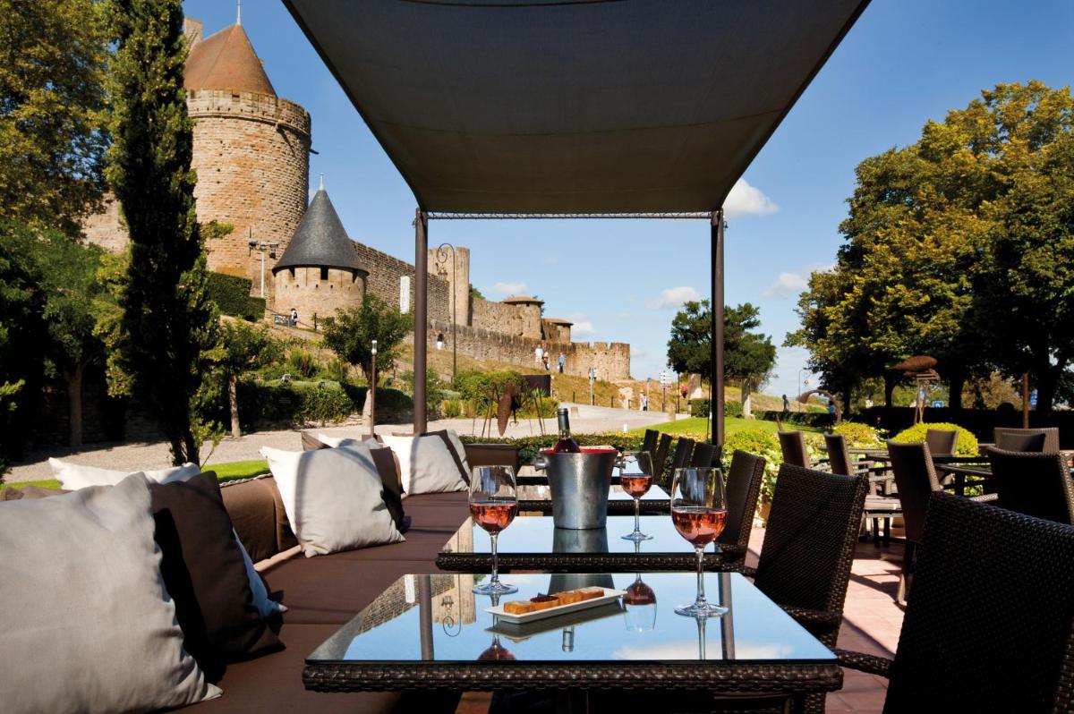 Coin salon dans l'établissement Hôtel du Château & Spa - Teritoria