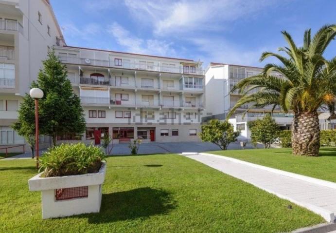 Apartamento con piscina en el centro de Sanxenxo - Housity