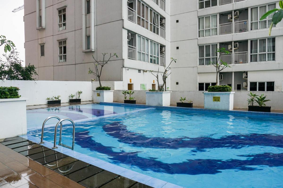 Cozy Minimalist Studio @ Taman Melati Margonda Apartment By Travelio - Housity