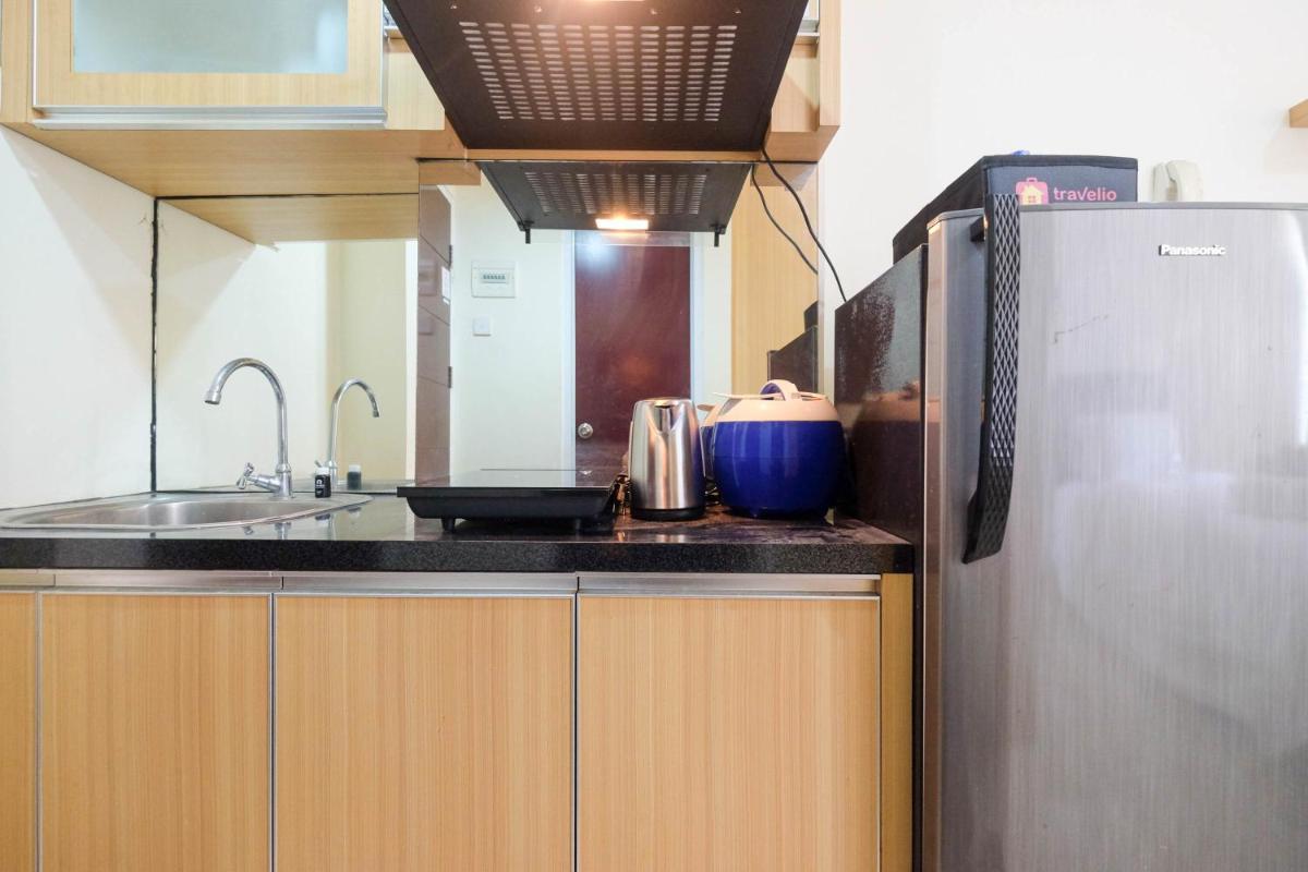 Cozy Minimalist Studio @ Taman Melati Margonda Apartment By Travelio - Housity