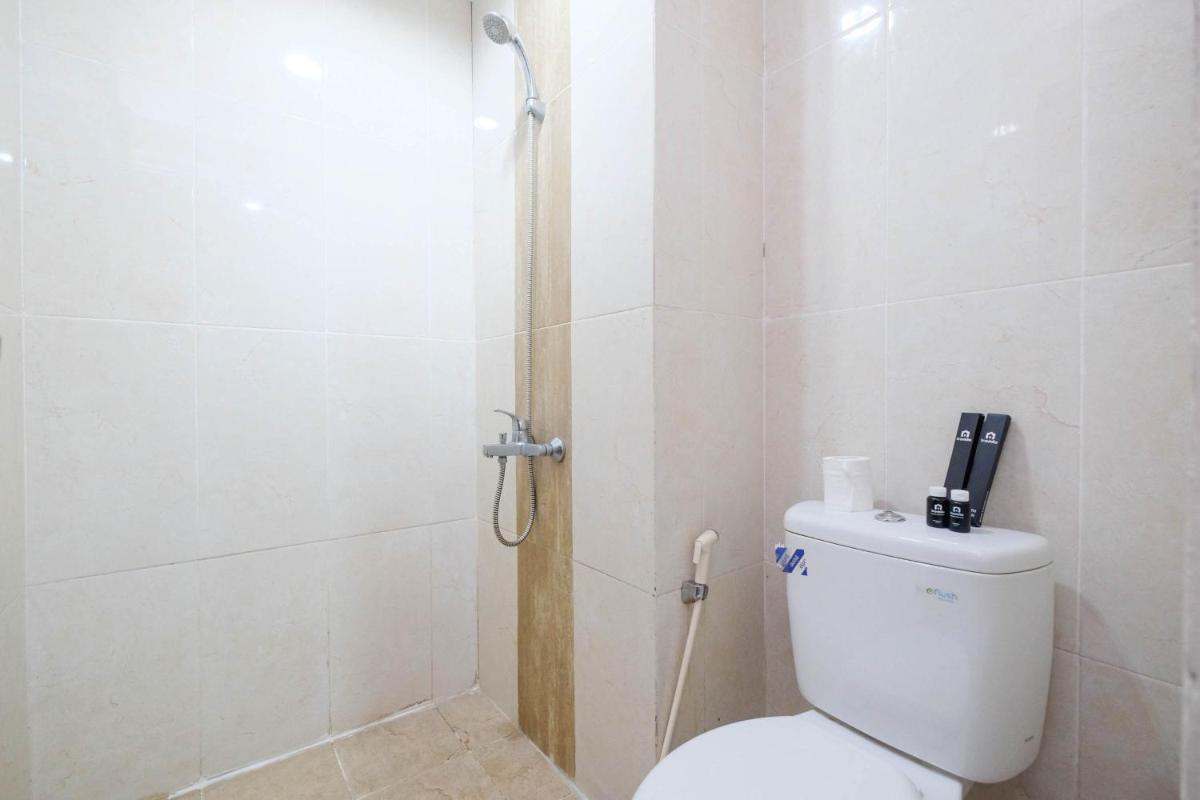 Cozy Minimalist Studio @ Taman Melati Margonda Apartment By Travelio - Housity