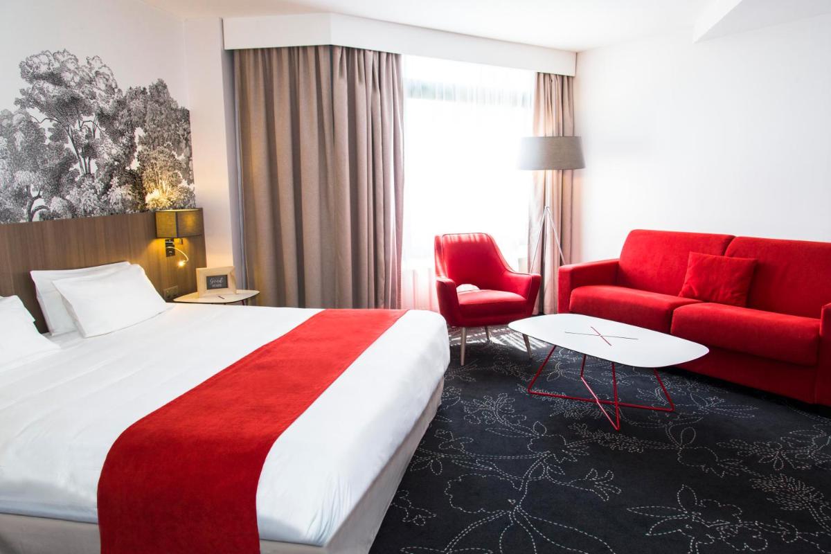 Un ou plusieurs lits dans un hébergement de l'établissement Holiday Inn Calais Coquelles by IHG
