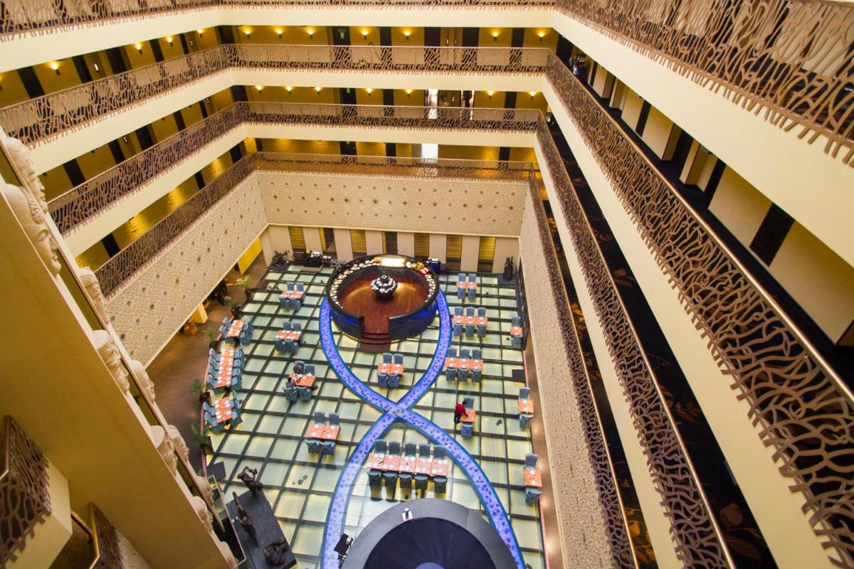 an overhead view of a shopping mall with a blue track at Sterlings Mac Hotel in Bengaluru