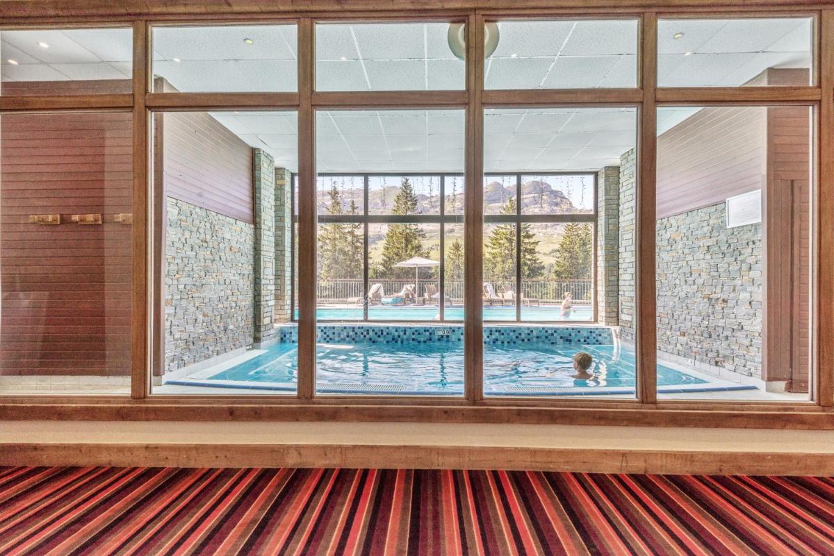 Piscine de l'établissement Résidence Pierre & Vacances Premium Les Terrasses d'Eos ou située à proximité