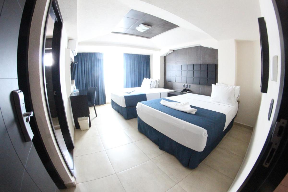 Hotel Portonovo Plaza Malecon - Housity