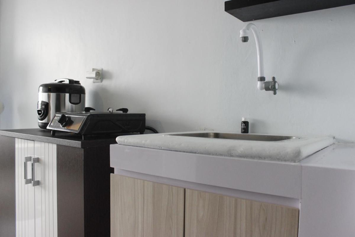 Modest 2BR Apartment at The Jarrdin Cihampelas By Travelio - Housity