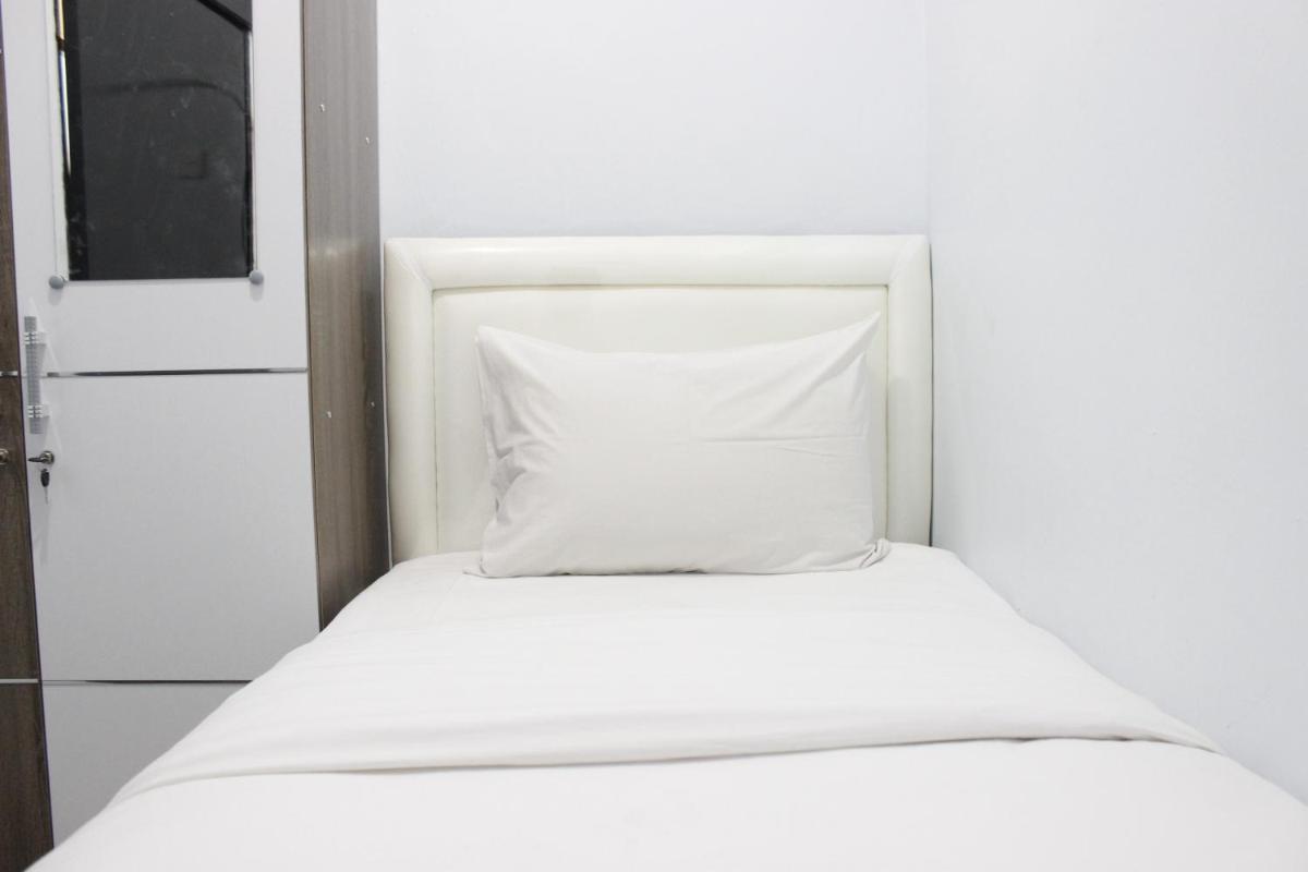 Modest 2BR Apartment at The Jarrdin Cihampelas By Travelio - Housity