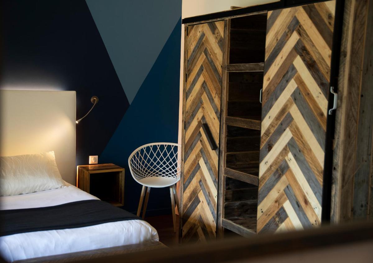 Un ou plusieurs lits dans un hébergement de l'établissement Les Frères Ibarboure - Hôtel 4 étoiles, Spa extérieur sensoriel et Restaurant étoilé à Bidart