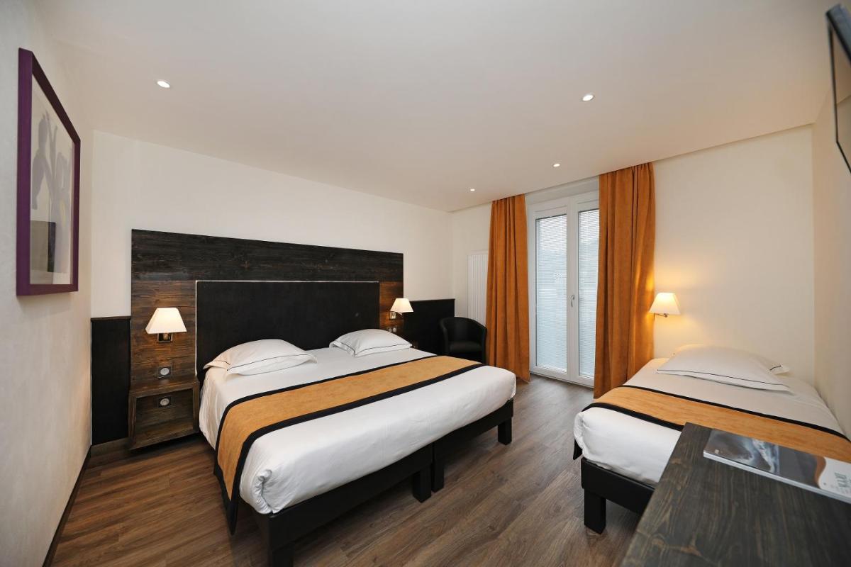Un ou plusieurs lits dans un hébergement de l'établissement Hotel de la Jamagne & Spa