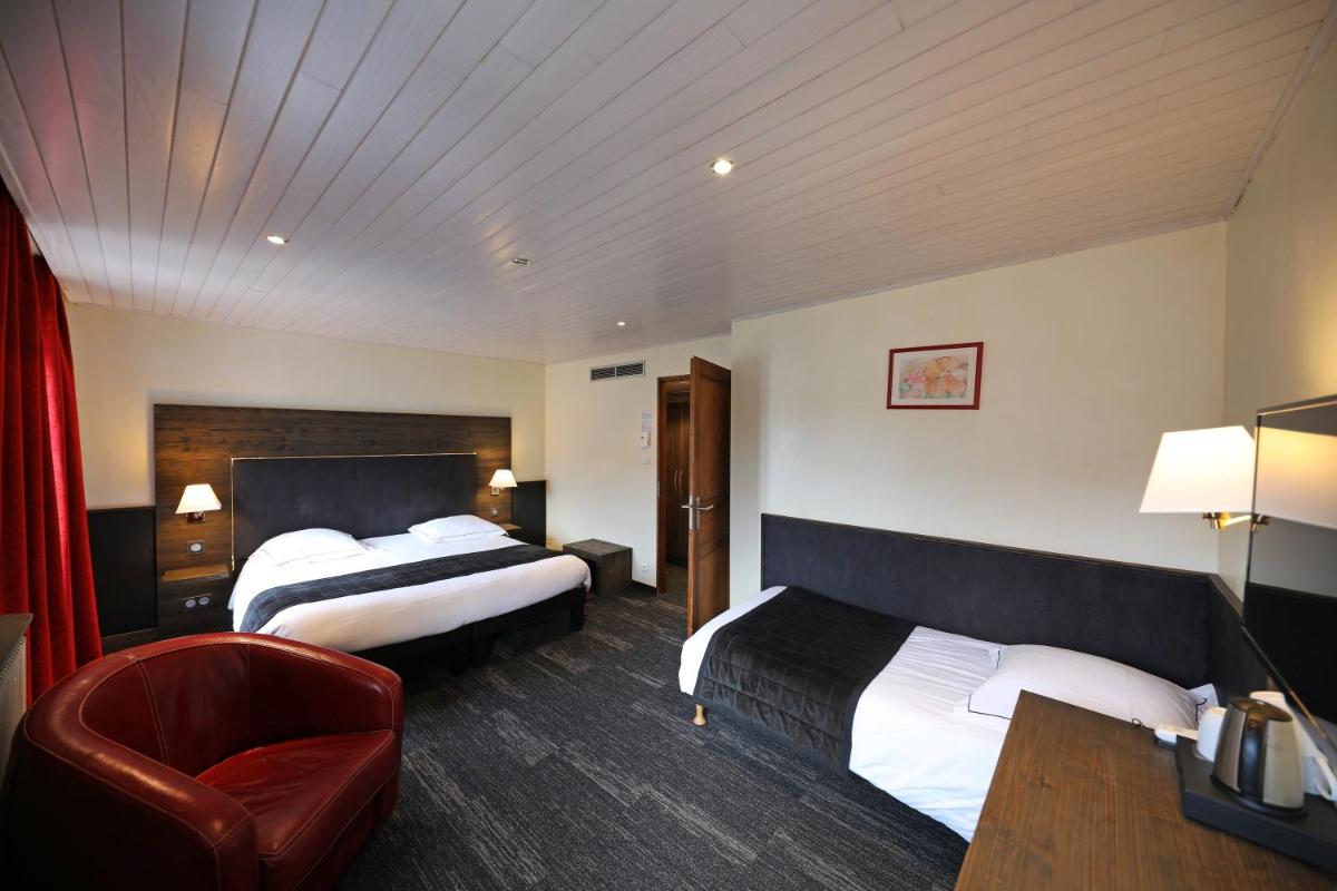 Un ou plusieurs lits dans un hébergement de l'établissement Hotel de la Jamagne & Spa