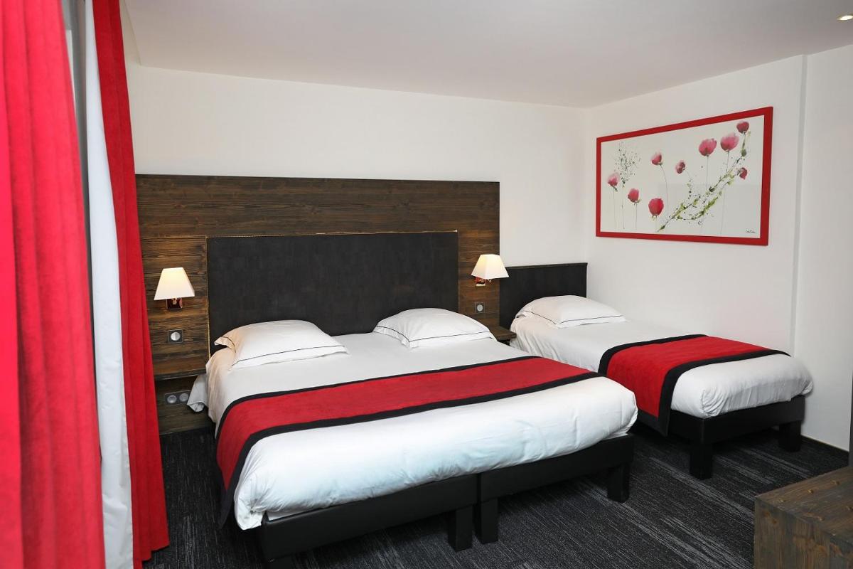 Un ou plusieurs lits dans un hébergement de l'établissement Hotel de la Jamagne & Spa