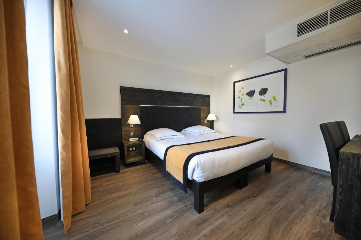 Un ou plusieurs lits dans un hébergement de l'établissement Hotel de la Jamagne & Spa