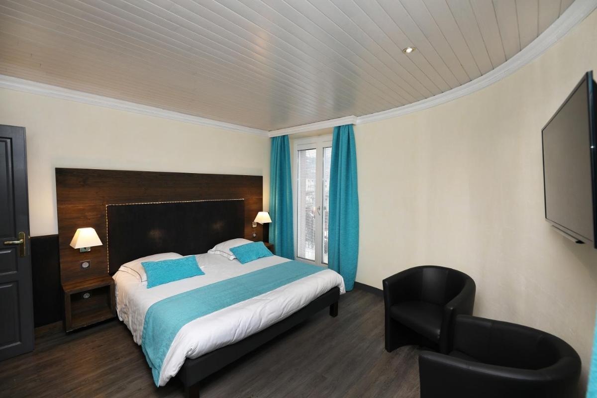 Un ou plusieurs lits dans un hébergement de l'établissement Hotel de la Jamagne & Spa