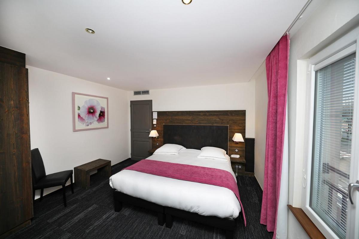 Un ou plusieurs lits dans un hébergement de l'établissement Hotel de la Jamagne & Spa