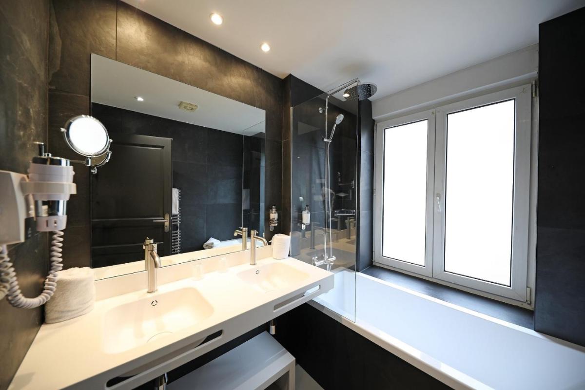 Salle de bains dans l'établissement Hotel de la Jamagne & Spa