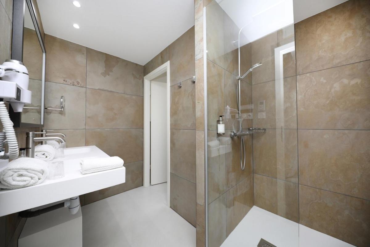 Salle de bains dans l'établissement Hotel de la Jamagne & Spa