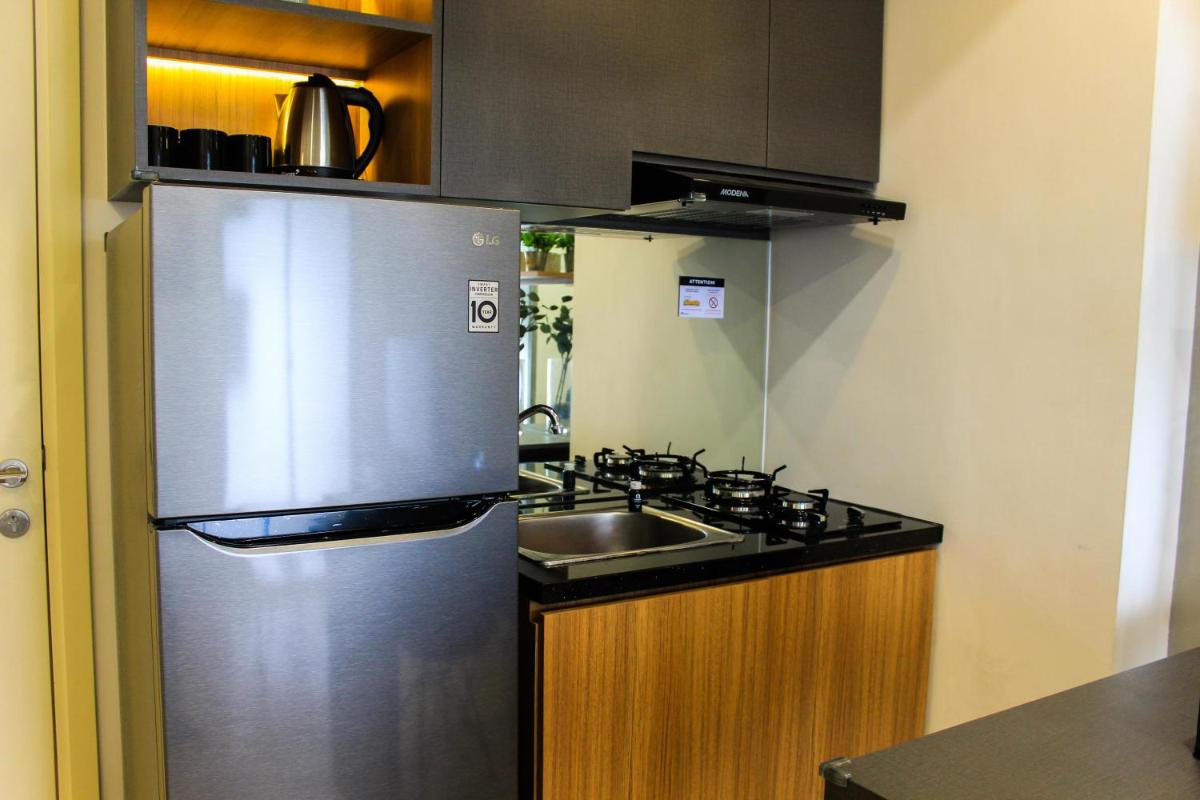 Warm and Cozy 3BR Apartment at M-Town Residence By Travelio - Housity