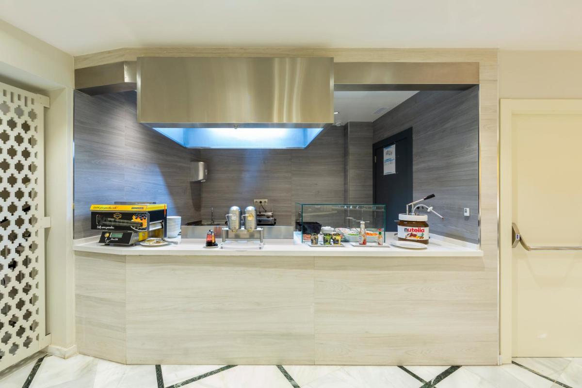 Una cocina o zona de cocina en Catalonia Granada