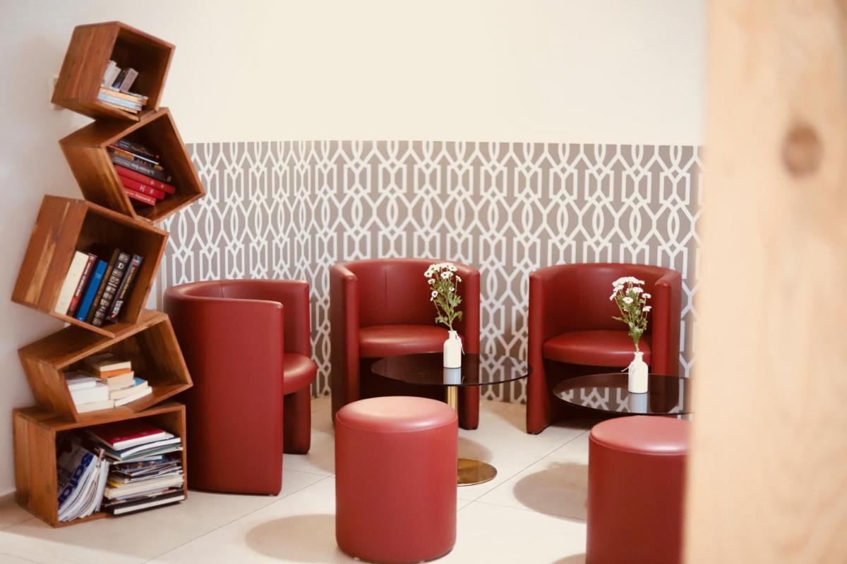 Coin salon dans l'établissement Hôtel Brésil Opéra SPA