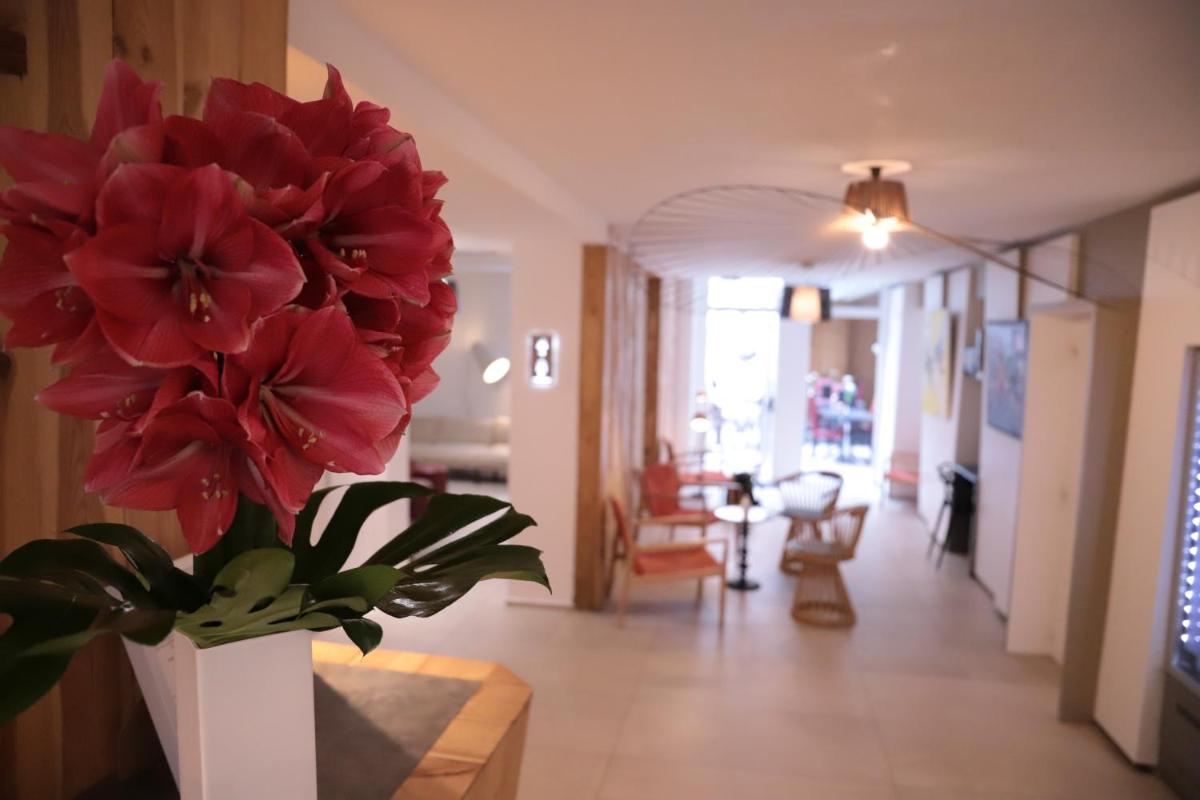 Coin salon dans l'établissement Hôtel Brésil Opéra SPA