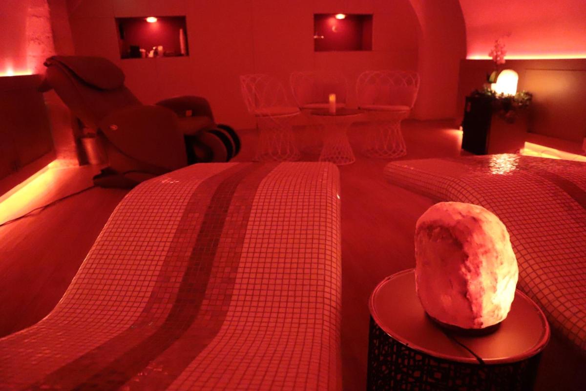 Un ou plusieurs lits dans un hébergement de l'établissement Hôtel Brésil Opéra SPA